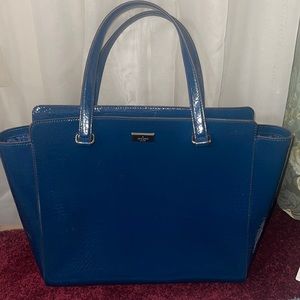 Kate Spade big purse. Never used no tags. Dark blue in color